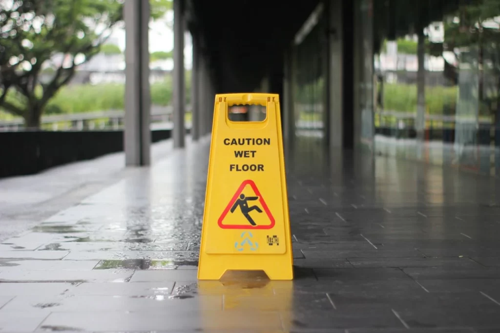 North Charleston Slip And Fall Accident Lawyer | Charleston Personal Injury Attorney | Best Personal Injury Attorney Charleston | North Charleston Slip and Fall Lawyer | Wet floor sign outside